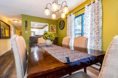 Dining opens to kitchen