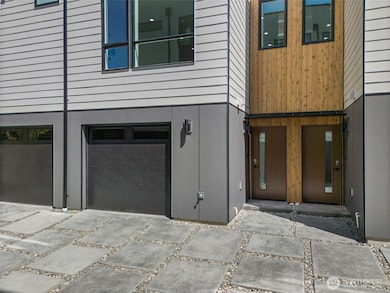 Entry and private garage. Model home.