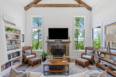 Picture windows in living room.