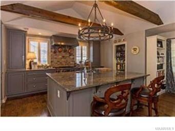 ANOTHER VIEW OF THE KITCHEN LOOKING TOWARDS THE PL