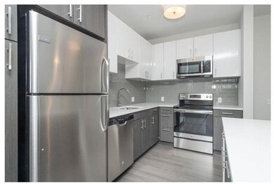 99 Tremont @ Oak Square unit 413, Boston, MA 02135 - photo 2