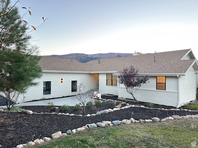 View of front facade and a mountain view