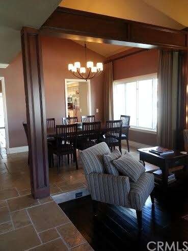 Beautiful Formal Dining Room Overlooking Living Ro
