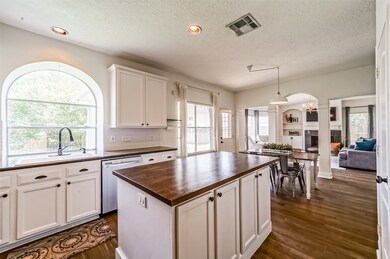 The cook of the family won't have to be away from the hub of activity in this open concept kitchen that boasts all stainless appliances including a 4 burner gas cooktop, dual convection ovens, a dishwasher, and a dual basin sink.