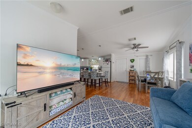 Living area featuring wood finished floors, ceilin
