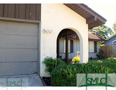 Exterior Front. Double garage, parking off-street.