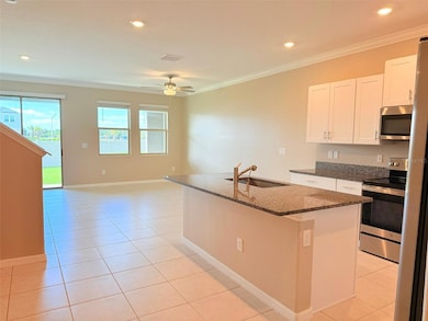 31763 Blue Passing Loop, Wesley Chapel, FL 33545 - photo 7