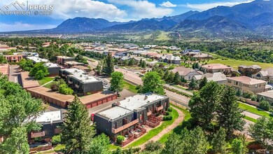 Aerial perspective of suburban area featuring a mountainous background
