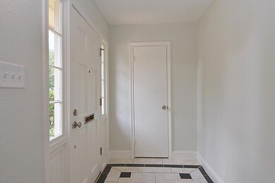 Entry - Coat closet is conveniently located at the