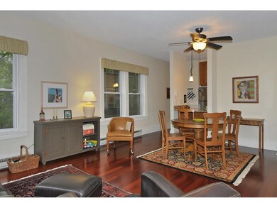 The open floor plan combining living and dining ar