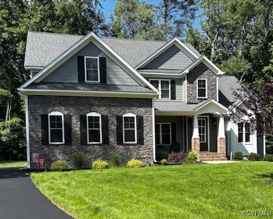 Beautiful Stone and Hardie Home with tapered colum