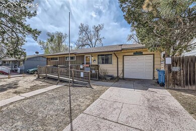 Single story home featuring fence, driveway, a dec