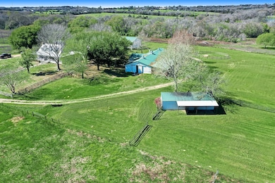 Improvements include 2 individual homes, 10 stall