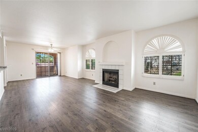New Wood Laminate Flooring & Gas Fireplace