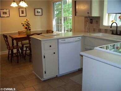 Kitchen - The kitchen has nice tile floor, tile ba