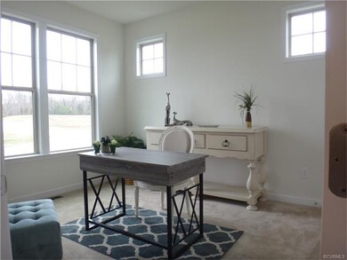 Front Bedroom/Flex Room with double door closet.