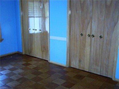 Upstairs bedroom has double closets.