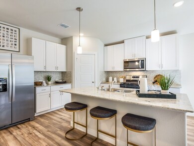 Photo is not of the actual home, but is an inspirational photo of builder’s model home and may depict options, furnishings, and/or decorator features that are not included