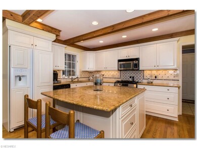 Open kitchen with granite counter tops and stainle