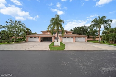 View of front of property featuring concrete drive