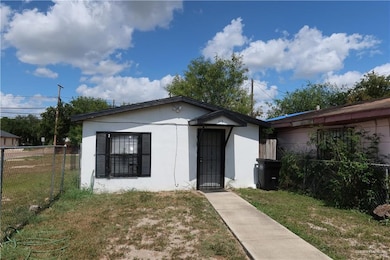 Bungalow-style home featuring stucco siding