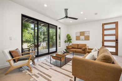 Living area with recessed lighting and a ceiling 