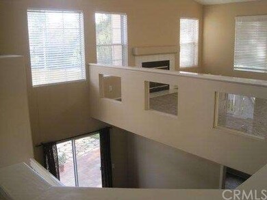 View from Entry Hallway into Living Room and down 