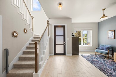 As you enter the home, you will be impressed with the light-and-bright nature of the open floorplan with neitral wood-look tile floors, Sherwin Williams paint, and high ceilings. The flex room to your left as you enter the room provides endless possibilities...home office, play room, formal sitting area, or even a second dining room for those large holiday gatherings. Overlooking the front porch and out to Keystone Brook Way, this airy space boasts upgraded lighting and relaxing views.