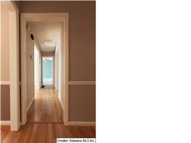 Hallway to master bedroom, kitchen or den