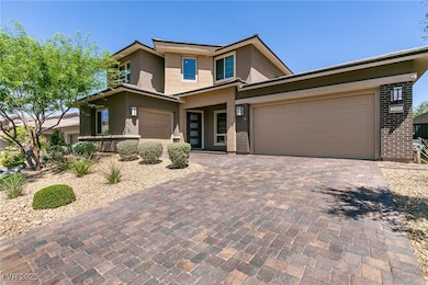 View of front of house featuring stucco siding, br