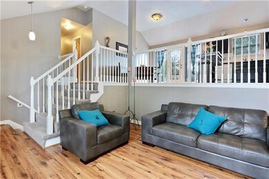 So open to the kitchen/dining/deck and down a few 