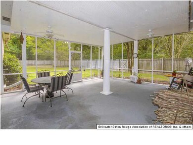 Screened porch for outdoor entertaining.