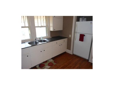 Kitchen. Freshly painted cabinets, finished floori