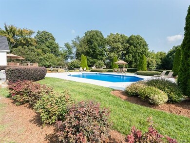Beautiful landscaping with in-ground pool!