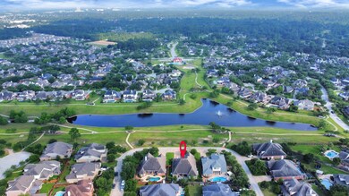 The home is directly across the street from the lake.