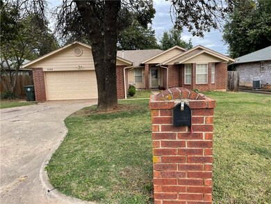 Another view of house with established shade tree 