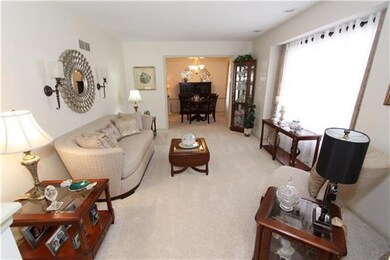 The Living Room welcomes you...measures 15'x11'.