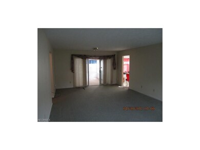 Living Room, notice the sliding glass door to the 