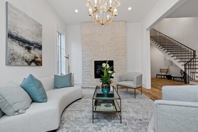 Gas log fireplace surrounded by slurried brick