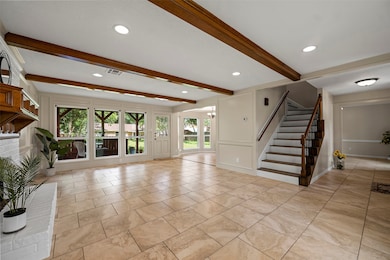 Open floor plan with views of the backyard.
