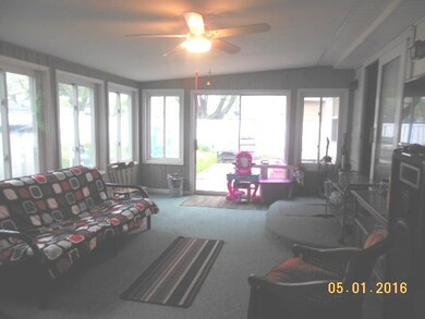 Sun room to west end with slider to back vinyl fen