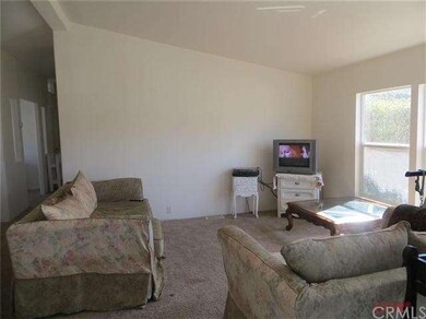 Living room with cathedral ceilings and lots of wi