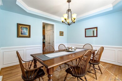 Formal dining room view into the kitchen and the d