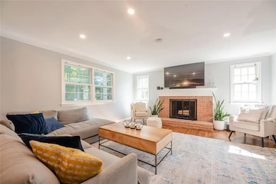 FAMILY ROOM WITH FIREPLACE ADJACENT TO THE FLEX RO