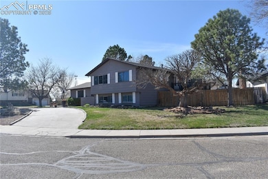 View of front of property featuring concrete drive