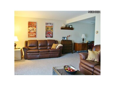 Living room opens to the dining room.
