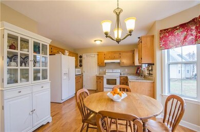 The kitchen features new granite countertops, bright and open, lots of windows for great natural lighting.
