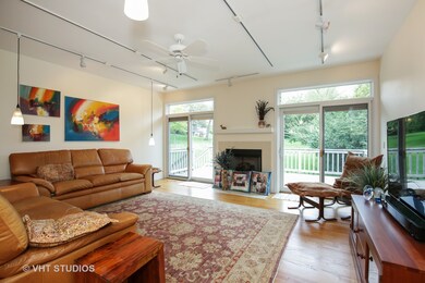Family room with gas fireplace. Opens to 20x11 Tre