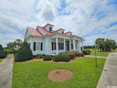 View of front facade featuring a front yard