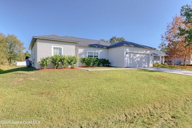 561 Windswept Ave SW, Palm Bay, FL 32908 - photo 2